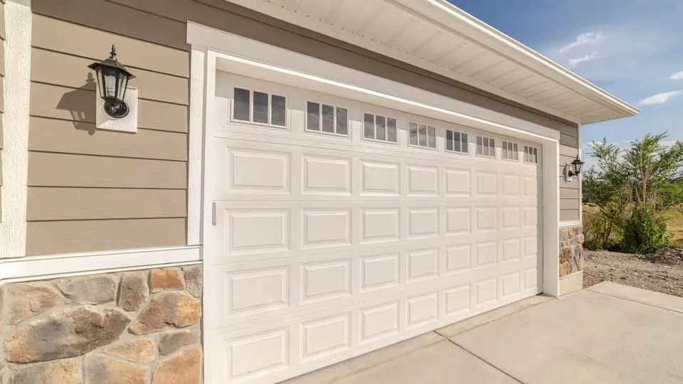 Repair or replace? Choosing the right garage door